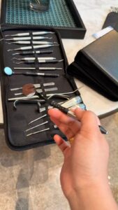 Dental instrument kit shown to the client